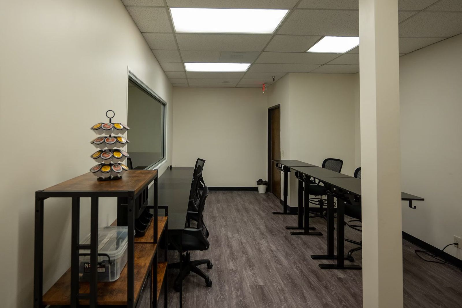Suite B viewing room with refreshments and desks